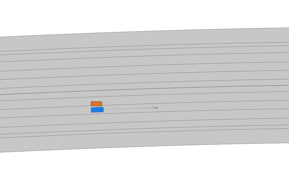 commonroad-reactive-planner's ego passing left of the cut-in vehicle, drawn in the official renderer
